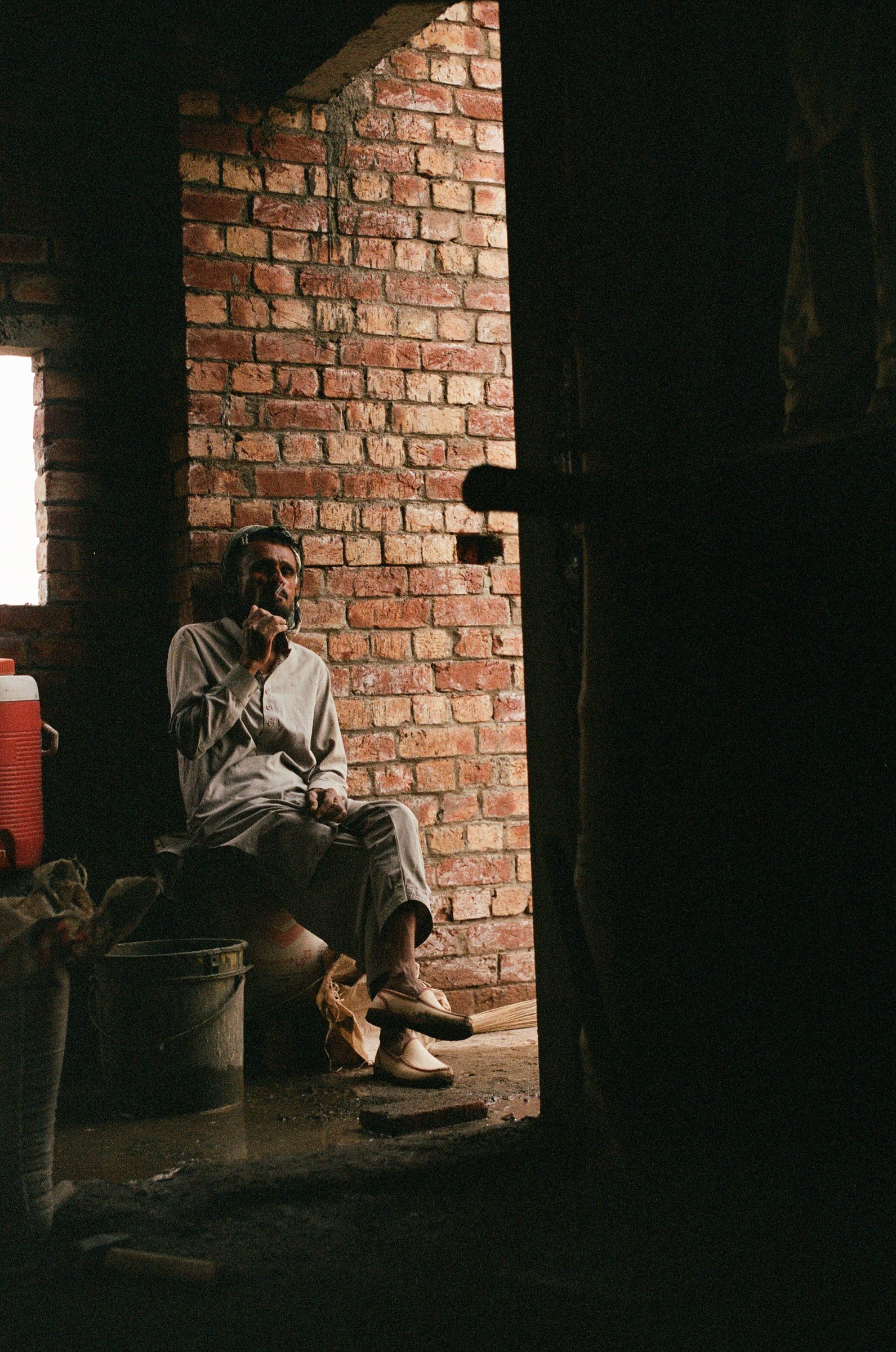 Fig. — a smoke, in the doorway