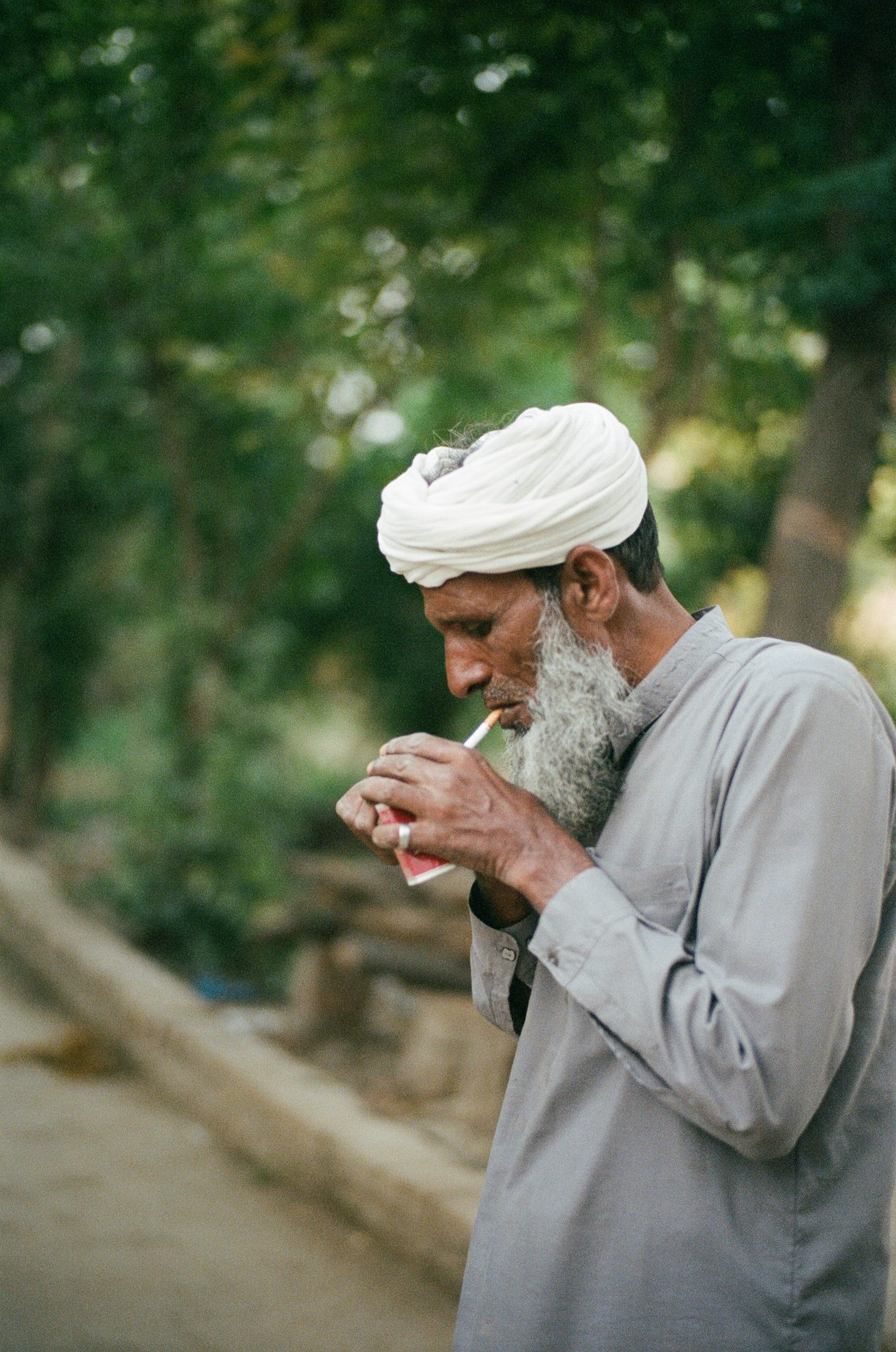 Fig. — lighting a cigarette