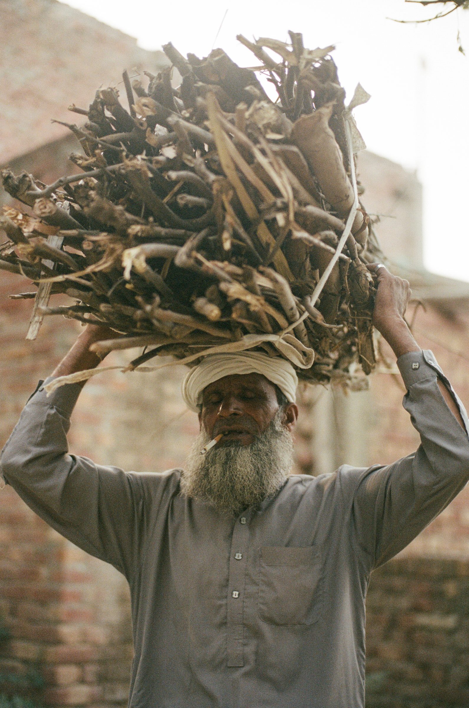 Fig. — carrying the day's wood